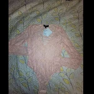 Brand new very fancy bodysuit never worn with tags